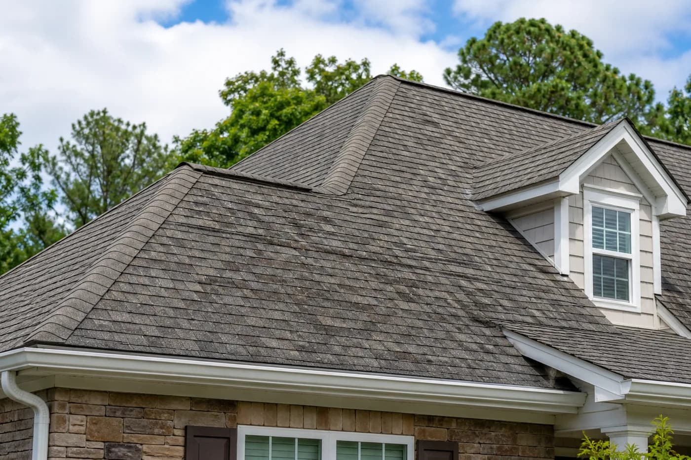 Charlotte NC home roof with aging asphalt shingles and no people, ladders, tools, vehicles, or equipment visible