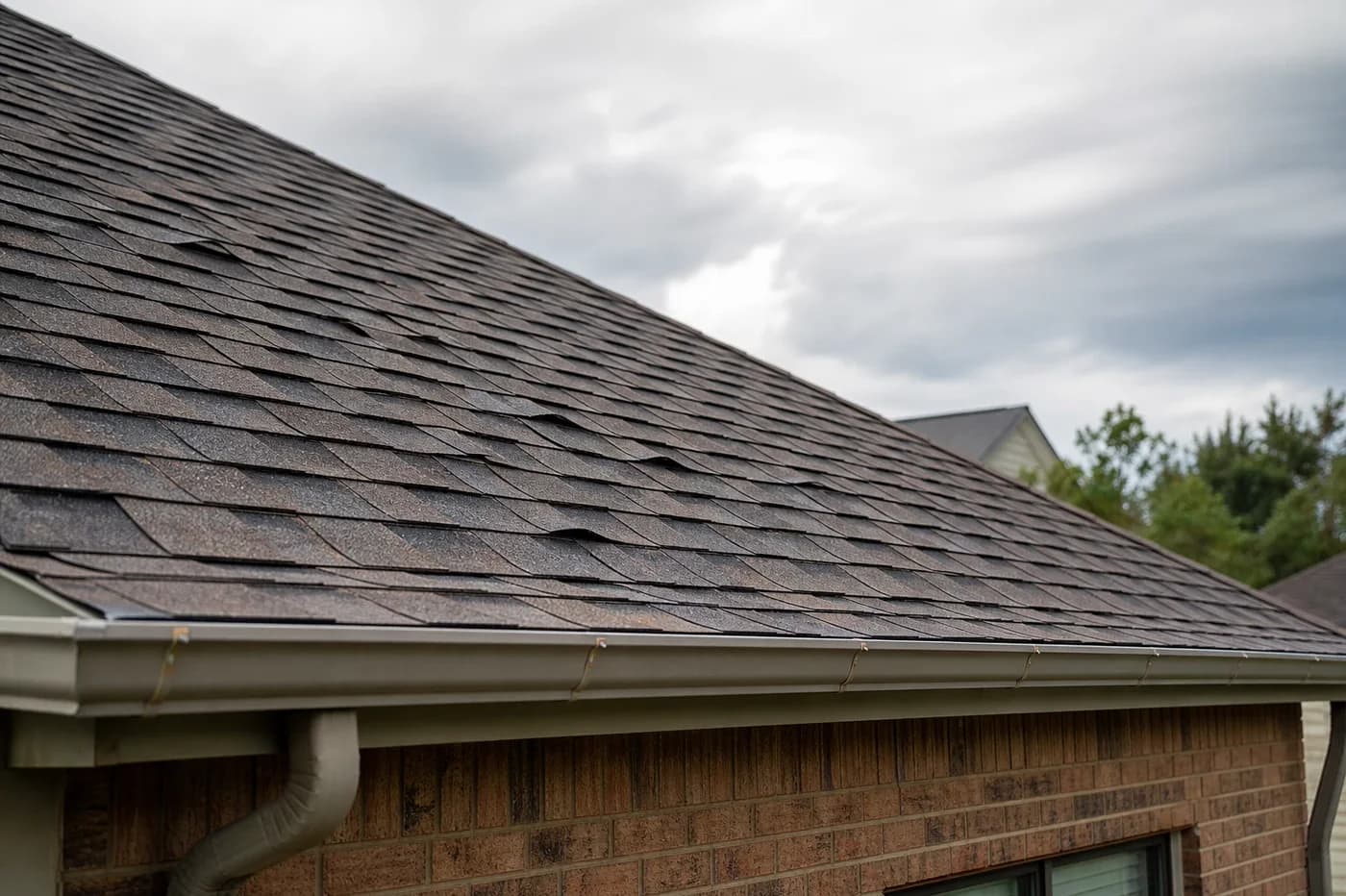 Indian Trail NC asphalt shingle roof with curled and cupped shingle edges