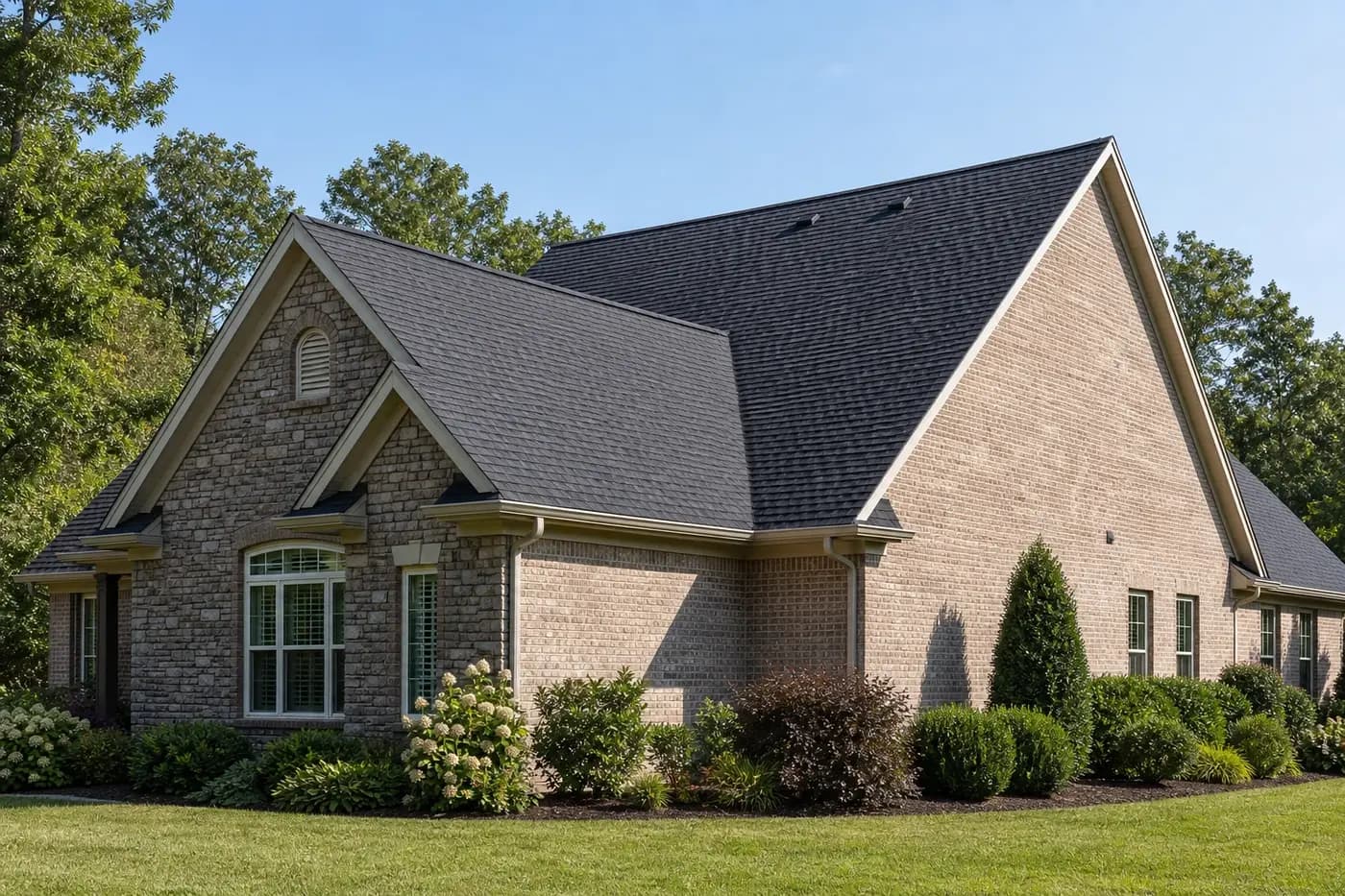 Roof-dominant upscale Indian Trail NC home showing naturally sunny and shaded architectural shingle slopes