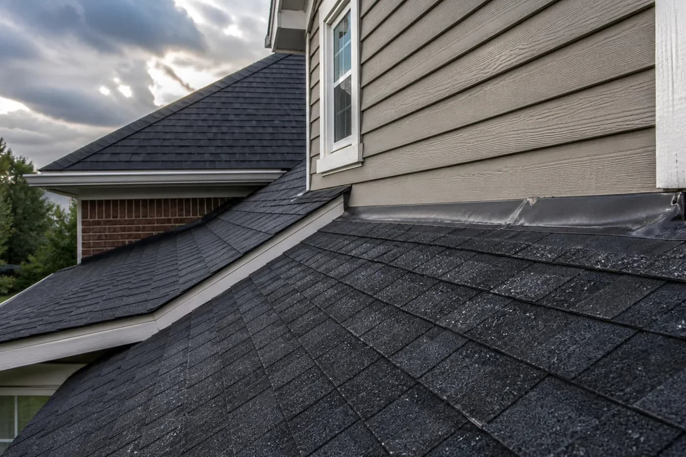 Indian Trail NC asphalt shingle roof and wall flashing after wind-driven rain