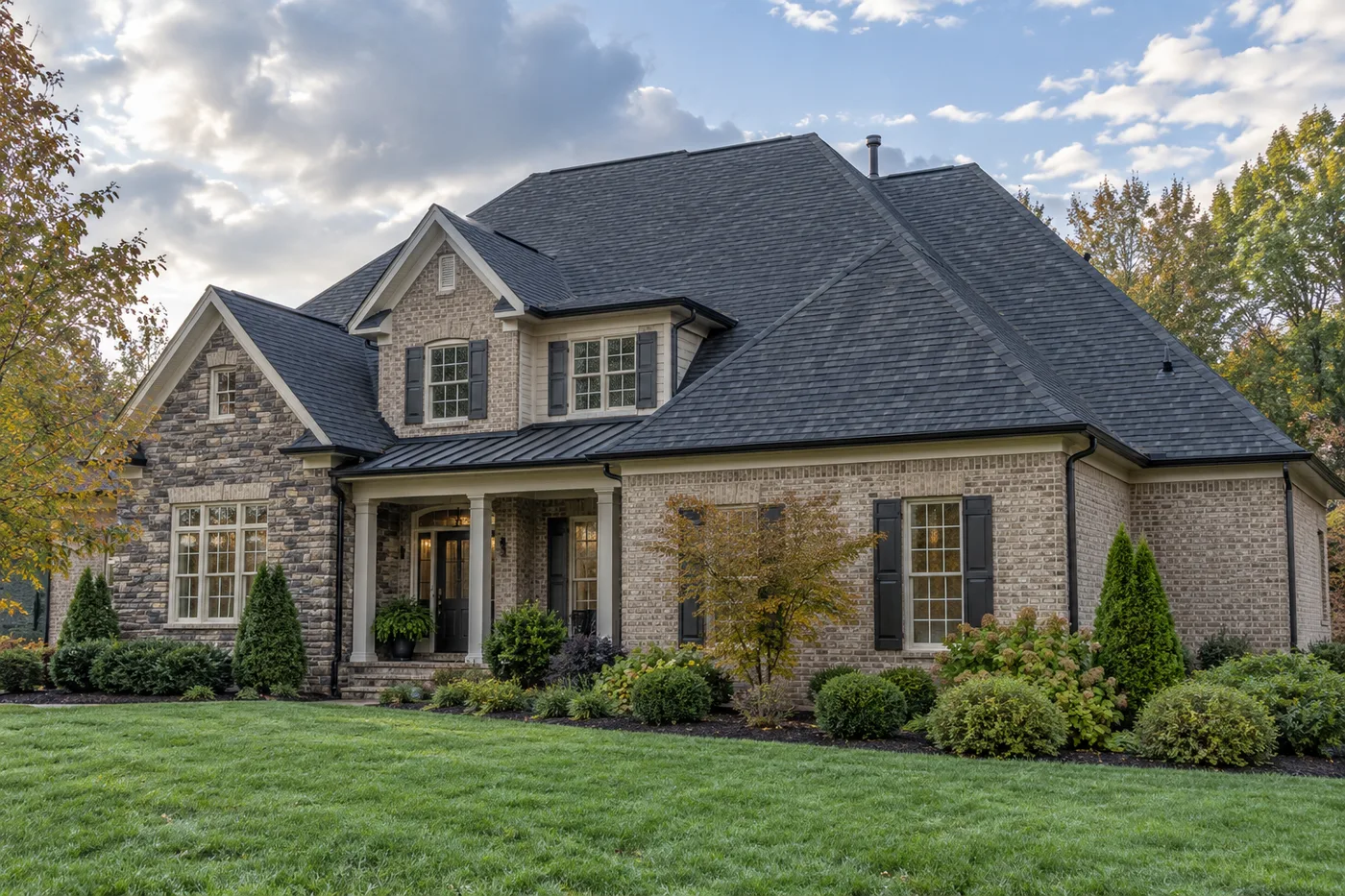 Representative upscale Indian Trail home with a prominent charcoal architectural-shingle roof after stormy weather