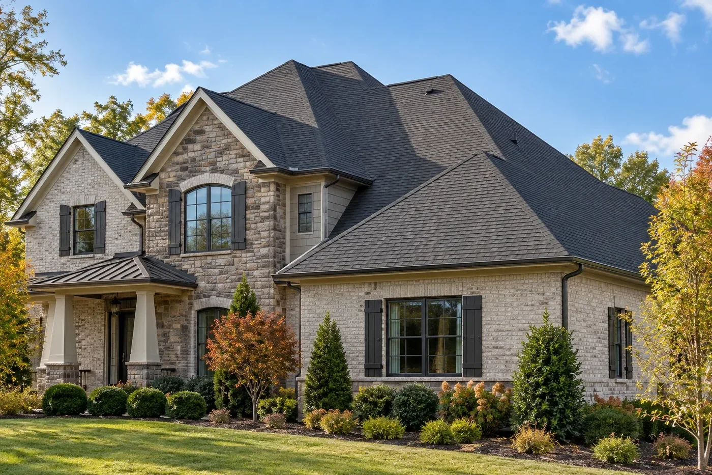 Representative upscale Indian Trail home with a coherent charcoal architectural-shingle roof