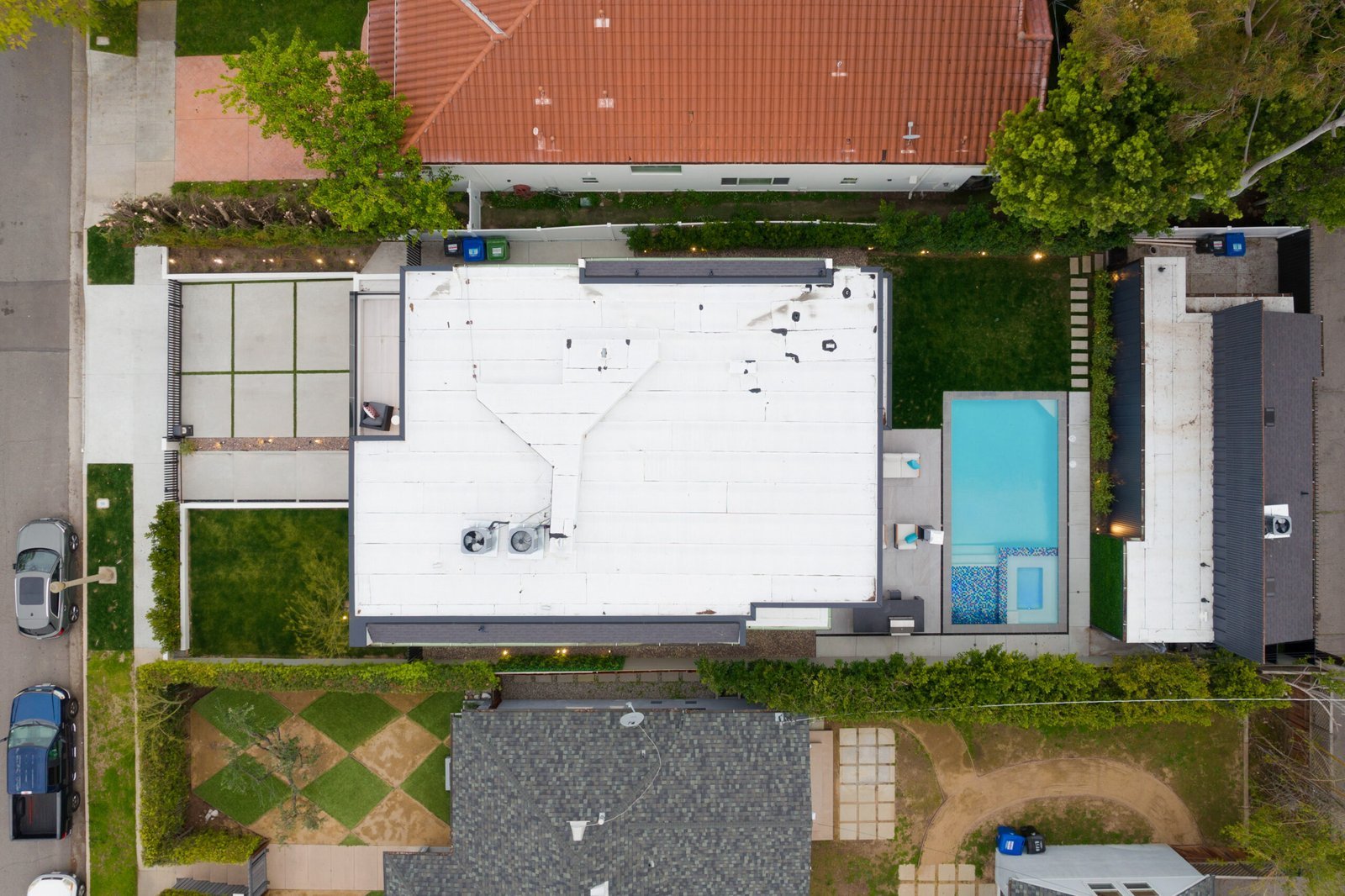 aerial-view-of-a-house-and-a-pool-from-above-in-a-2024-04-22-17-11-18-utc-scaled-1.jpg